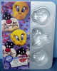 Book cover for "[Sylvester & Tweety cake pan.]".